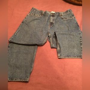 Medium wash colored mens jeans. Size 46 X 30